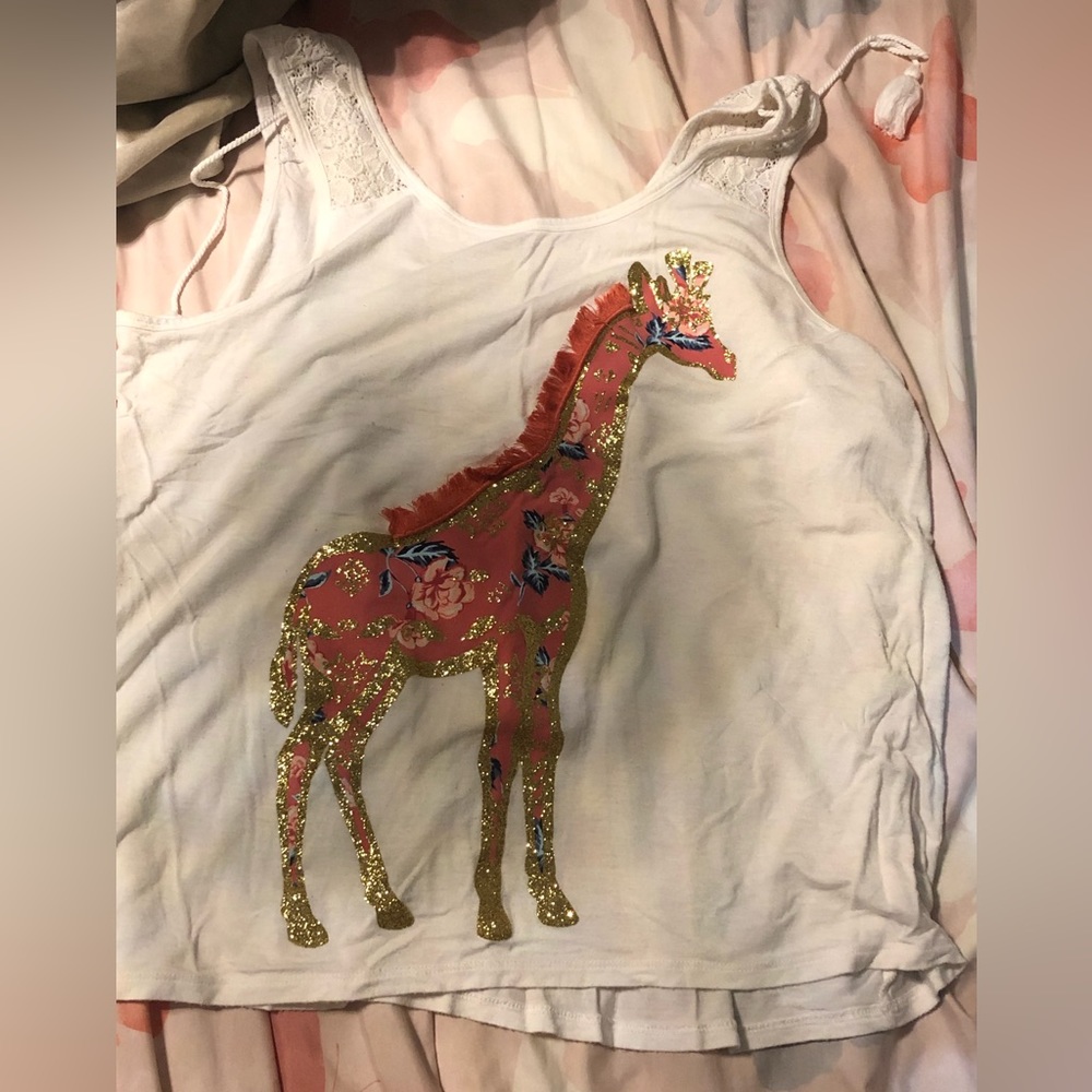 Brand: Justice.  Color: White, gold, blue, and pink.        Size: L